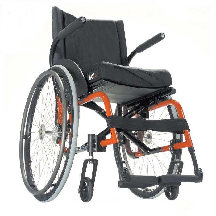 Manual wheelchair with handrim projections